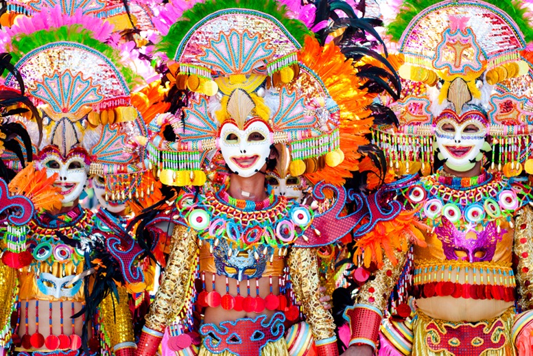 Parade of colorful smiling mask at Masskara Festival, Bacolod City, Philippines